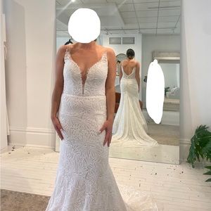 NEW wedding dress. With tags.